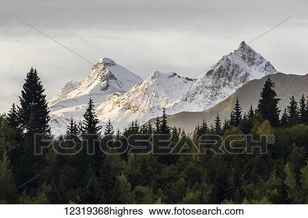 Stock Photograph - Panoramic view of the Greater Caucasus Mountains, as seen from the road between Jvari and Mestia, Zemo Svaneti National Park; Samegrelo-Zemo Svaneti, Georgia. Fotosearch
