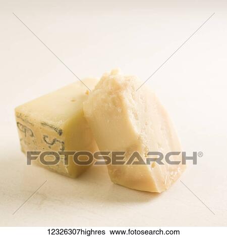 Stock Photograph - Parmesan cheese on a white background. Fotosearch