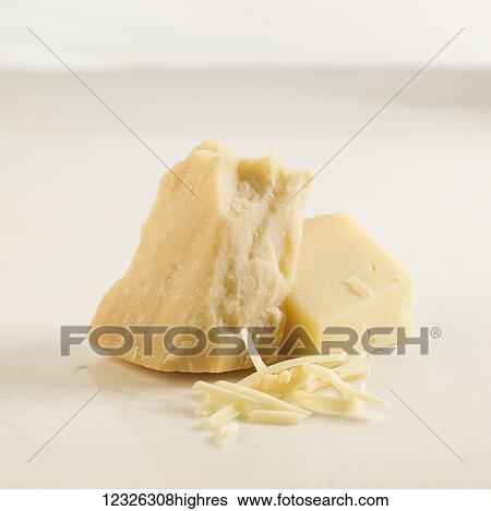 Stock Photograph - Parmesan cheese on a white background. Fotosearch