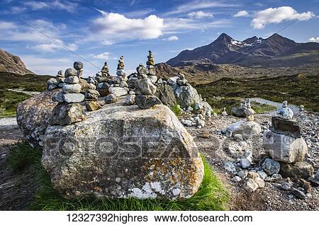 Stock Photograph - Piles of rocks near the old bridge; Sligachan, Isle of Skye, Scotland. Fotosearch