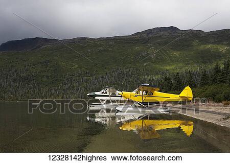 Piper PA-18 Super Cub moored along a shoreline in Southwest Alaska, USA View Large Photo Image Stock Photograph - Piper PA-18 Super Cub moored along a shoreline in Southwest Alaska, USA. Fotosearch