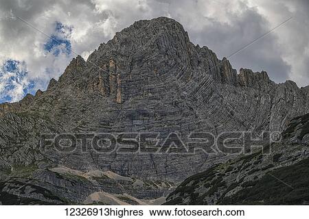Plate tectonics at work, this folded mountain in the Italian Dolomites is a great example; Cortina, Italy View Large Photo Image Stock Photograph - Plate tectonics at work, this folded mountain in the Italian Dolomites is a great example; Cortina, Italy. Fotosearch
