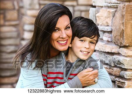 Portrait of a mother with her son; Oregon, United States of America View Large Photo Image Stock Photograph - Portrait of a mother with her son; Oregon, United States of America. Fotosearch