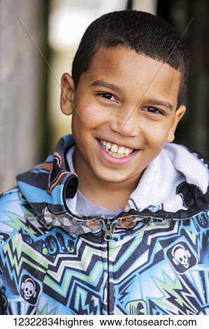 Stock Photograph - Portrait of a young boy; Oregon, United States of America. Fotosearch
