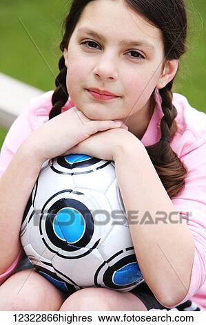 Portrait of a young girl with her soccer ball; Oregon, United States of America View Large Photo Image Stock Photograph - Portrait of a young girl with her soccer ball; Oregon, United States of America. Fotosearch