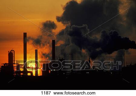 Processing facility in the morning with smoke View Large Photo Image Stock Photo - Processing facility in the morning with smoke. Fotosearch