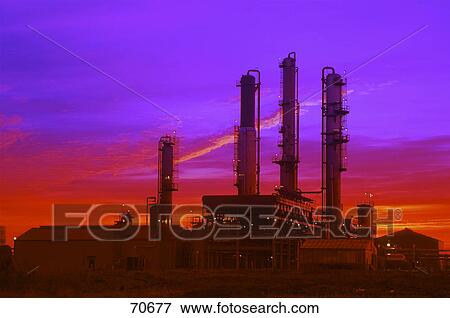 Stock Photo - Refinery at sunset. Fotosearch