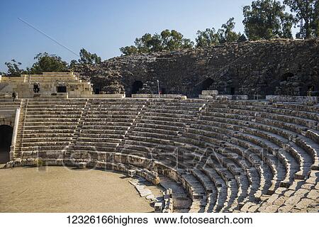 Stock Photograph - Ruins of an amphitheatre in Beit Shearim National Park; Beit Shean, North District, Israel. Fotosearch