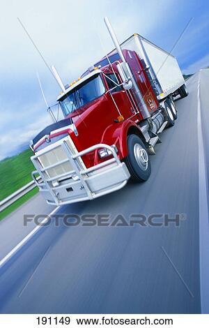 Stock Photo - Semi truck driving on highway. Fotosearch