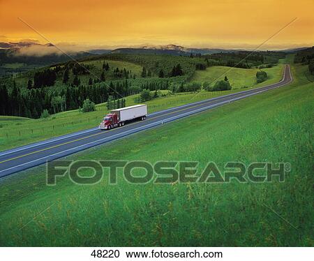 Stock Image - Semi truck on highway. Fotosearch