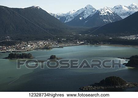 Stock Photograph - Sitka Sound, with cloudy water from herring milt; Alaska, United States of America. Fotosearch