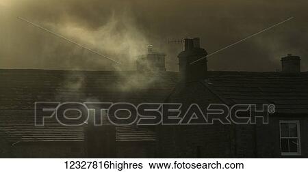 Smoke from chimneys on a rooftop floats into the air; Reeth, Yorkshire, England View Large Photo Image Stock Photograph - Smoke from chimneys on a rooftop floats into the air; Reeth, Yorkshire, England. Fotosearch