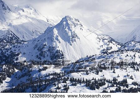 Stock Photograph - Snow covered Kenai Mountains, Kachemak Bay State Park; Alaska, United States of America. Fotosearch