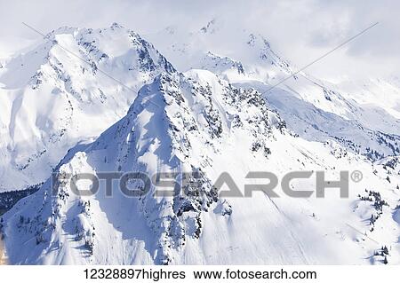 Stock Photograph - Snow covered Kenai Mountains, Kachemak Bay State Park; Alaska, United States of America. Fotosearch