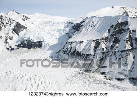 Snow covered mountains in St. Elias Wilderness, Southeast Alaska; Alaska, United States of America View Large Photo Image Stock Photograph - Snow covered mountains in St. Elias Wilderness, Southeast Alaska; Alaska, United States of America. Fotosearch