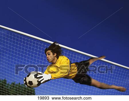 Soccer goalkeeper making a save View Large Photo Image Stock Image - Soccer goalkeeper making a save. Fotosearch
