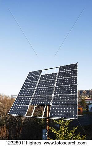 Stock Photograph - Solar panels and a blue sky; Homer, Alaska, United States of America. Fotosearch
