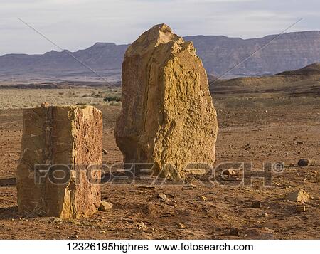 Stock Photograph - Standing stone blocks in the Ramon Nature Reserve; Mitspe Ramon, Israel. Fotosearch