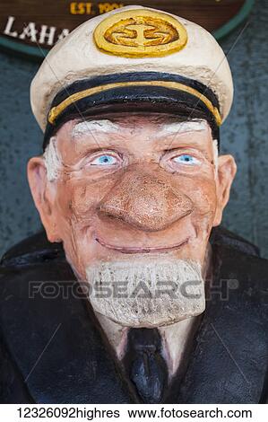 Stock Photograph - Statue of an old whaling captain in front of the Pioneer Inn; Lahaina, Maui, Hawaii, United States of America. Fotosearch