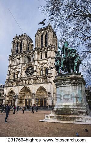 Stock Photograph - Statue of Charlemagne in front of the 0tre Dame Cathedral; Paris, France. Fotosearch