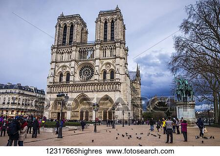 Stock Photograph - Statue of Charlemagne in front of the 0tre Dame Cathedral; Paris, France. Fotosearch