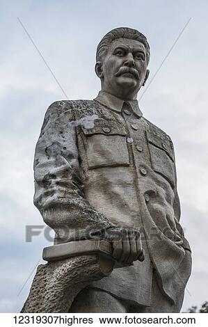 Stock Photograph - Statue of Stalin in front of the Joseph Stalin Museum; Gori, Shida Kartli, Georgia. Fotosearch