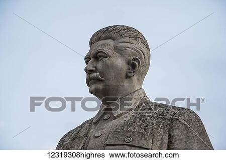 Stock Photograph - Statue of Stalin in front of the Joseph Stalin Museum; Gori, Shida Kartli, Georgia. Fotosearch