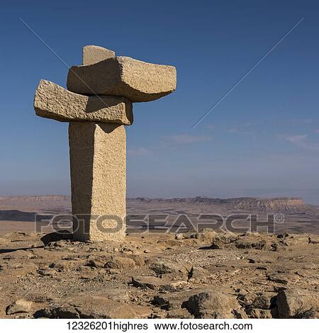 Stone sculpture at the Northern peak of Ramon crater, Negev Desert; Mitzpe Ramon, South District, Israel View Large Photo Image Stock Photograph - Stone sculpture at the Northern peak of Ramon crater, Negev Desert; Mitzpe Ramon, South District, Israel. Fotosearch