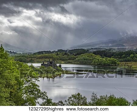 Sunlight on 15th century ruined Scottish castle on the banks of Loch Awe; Argyll and Bute, Scotland View Large Photo Image Stock Photograph - Sunlight on 15th century ruined Scottish castle on the banks of Loch Awe; Argyll and Bute, Scotland. Fotosearch
