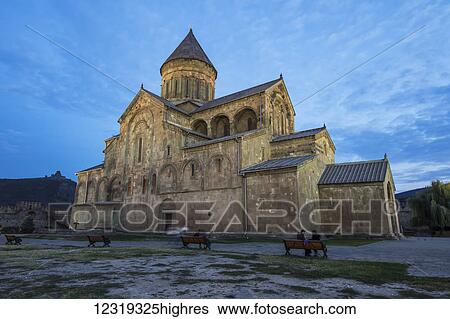 Stock Photograph - Svetitskhoveli Cathedral at dusk; Mtskheta, Mtskheta-Mtianeti, Georgia. Fotosearch