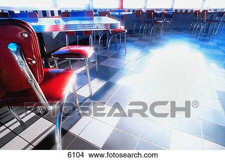 Tables and chairs in 50's style diner View Large Photo Image Picture - Tables and chairs in 50's style diner. Fotosearch