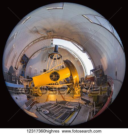 Telescope inside CFHT (Canada France Hawaii Telescope) Observatory atop Mauna Kea, 4200 meter mountain in Hawaii; Island of Hawaii, Hawaii, United States of America View Large Photo Image Stock Photograph - Telescope inside CFHT (Canada France Hawaii Telescope) Observatory atop Mauna Kea, 4200 meter mountain in Hawaii; Island of Hawaii, Hawaii, United States of America. Fotosearch