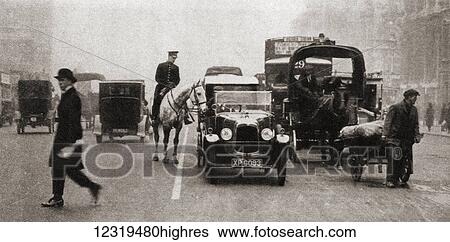 Stock Photograph - The first white line to be laid down in a London street as an experiment in solving the traffic congestion problems, which in 1924 were acute. From The Pageant of the Century, published 1934.. Fotosearch