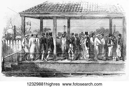 Stock Photograph - The Illustrated London News etching from 1854. An Indian railway station with people on platform waiting for a train. Fotosearch