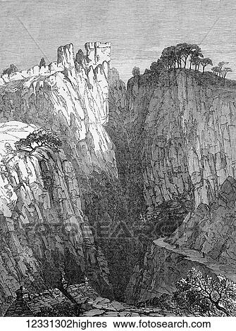 Stock Photograph - The Illustrated London News etching from 1854. Peveril Castle and the entrance to the Peak cave, Castleton, Derbyshire. Fotosearch