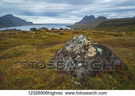 Stock Photograph - The mountains and coastline of the Strandir Coast; West Fjords, Iceland. Fotosearch