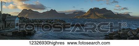 Stock Photograph - The old pier in Gjojur, a tiny fishing village along the Strandir Coast; West Fjords, Iceland. Fotosearch
