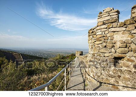 Stock Photograph - The remnants of 18th century fortifications and watchtowers; Sighnaghi, Georgia. Fotosearch