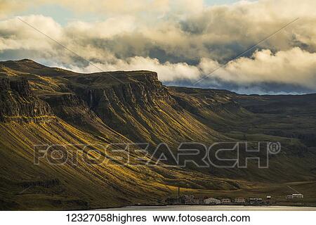 Stock Photograph - The village of Djupavik lies at the base of the sea cliffs along the Strandir Coast; Djupavik, West Fjords, Iceland. Fotosearch