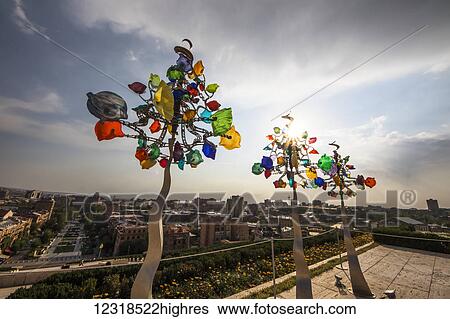 Stock Photograph - Three Glassinators, sculpture by Andrew Carson, on display at the Cafesjian Museum of Art in the Yerevan Cascade; Yerevan, Armenia. Fotosearch