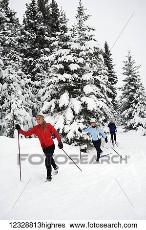 Three young women cross country skiing, Ohlson Mountain; Alaska, United States of America View Large Photo Image Stock Photograph - Three young women cross country skiing, Ohlson Mountain; Alaska, United States of America. Fotosearch