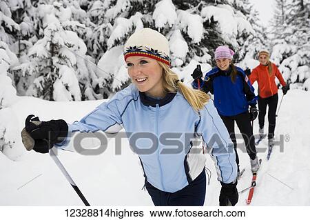 Three young women cross country skiing, Ohlson Mountain; Alaska, United States of America View Large Photo Image Stock Photograph - Three young women cross country skiing, Ohlson Mountain; Alaska, United States of America. Fotosearch