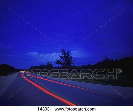 Time delay of cars on highway at night View Large Photo Image Stock Image - Time delay of cars on highway at night. Fotosearch