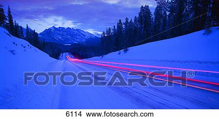 Picture - Time delay of icy mountain road. Fotosearch