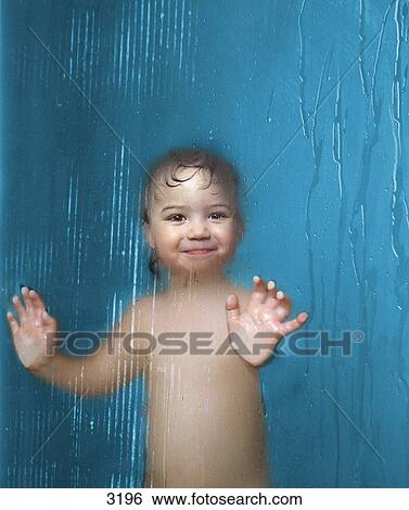 Stock Photograph - Toddler in the shower. Fotosearch