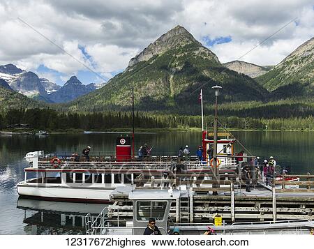 Stock Photograph - Tour boat on Upper Waterton Lake, Waterton Lakes National Park; Alberta, Canada. Fotosearch