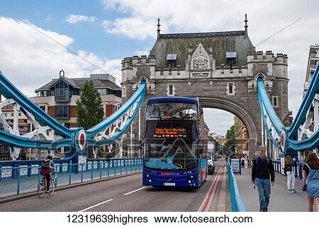 Tour bus crossing Tower Bridge; London, England View Large Photo Image Stock Photograph - Tour bus crossing Tower Bridge; London, England. Fotosearch