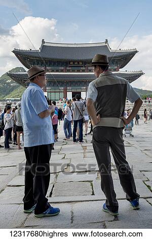 Stock Photograph - Tourists at Gyeongbokgung Palace; Seoul, Korea. Fotosearch