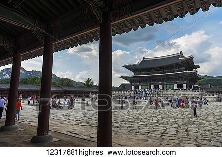 Stock Photograph - Tourists at Gyeongbokgung Palace; Seoul, Korea. Fotosearch