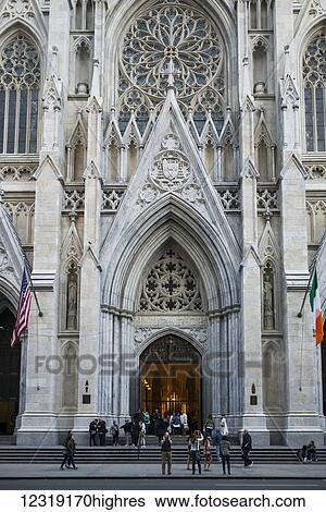 Tourists outside Saint Patrick's Cathedral; New York City, New York, United States of America View Large Photo Image Stock Photograph - Tourists outside Saint Patrick's Cathedral; New York City, New York, United States of America. Fotosearch